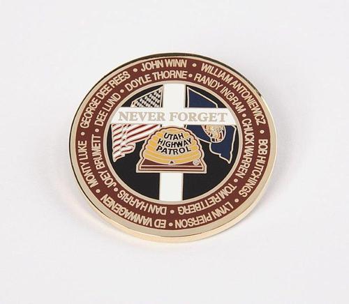 Courtesy photo
The Utah Highway Patrol Association has pulled this commemorative coin, which it was selling to raise money to place memorial crosses on private property, after being told it violated a court decision.