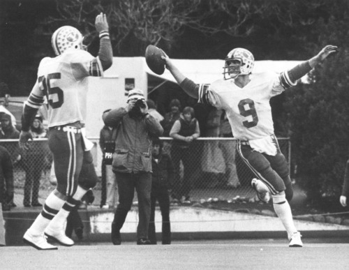 Tribune file photo
BYU's Jim McMahon (9) looks to Clay Brown for celebration after a touchdown in 1980.