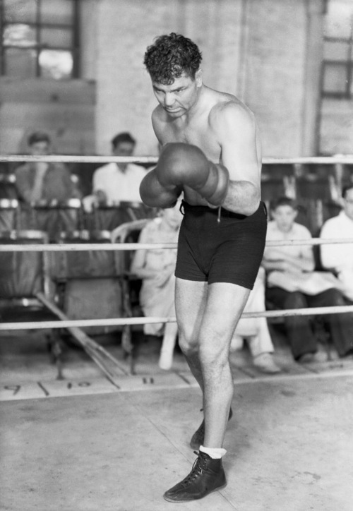 This is an August 1931 photo of former heavyweight boxing champion Jack Dempsey training in Reno, Nevada.  (AP Photo)
