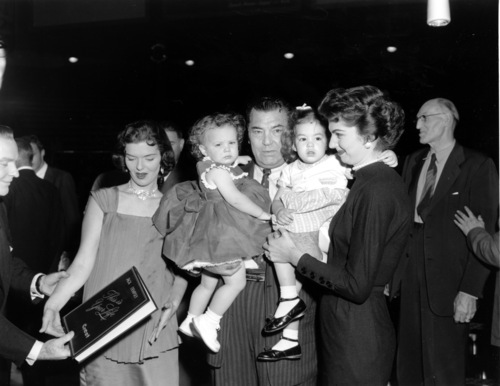 Jack Dempsey is shown with his family on 