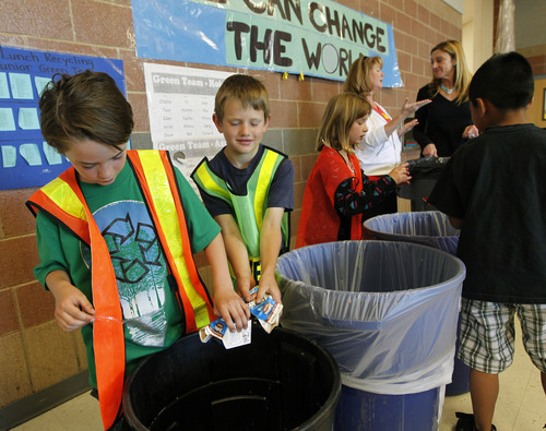 Al Hartmann  |  The Salt Lake Tribune 
Second-graders at Parley's Park Elementary School in Park City recycle most items from their lunch trays on Thursday, May 31.   The class finished second in the country in a contest for its recycling project.