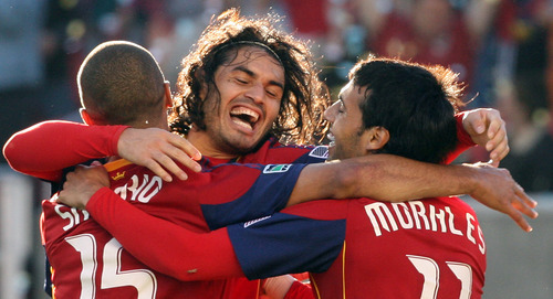 Photo by Leah Hogsten  |  The Salt Lake Tribune
RSL's Alvaro Saborio celebrates the second goal of the game in the first half with teammate Javier Morales and Fabian Espindola. .  Saborio kicked the goal in off a kick from teammate Fabian Espindola. 
Real Salt Lake was up 2-1against Kansas City Wizards Saturday at the half at RSL Stadium.   Sandy 5/29/10