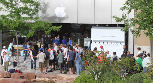 Tribune file photo
Eager customers line up at the Apple store at The Gateway in Salt Lake City for the new Apple iPhone 4S in 2011. The popular electronics retailer is breaking its lease to move to City Creek.