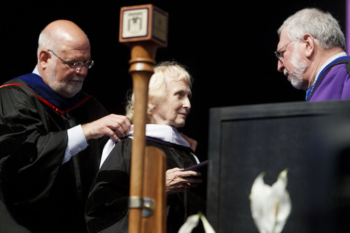 Trent Nelson  |  The Salt Lake Tribune
Noreen Rouillard, center, receives an honorary degree from Westminster College Provost Dr. James Seidelman, left, and President Dr. Michael Bassis at Commencement Saturday, June 2, 2012 at the Maverik Center in West Valley City.