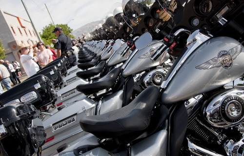 Michael Mangum  |  Special to the Tribune

Unified Police of Greater Salt Lake Harley-Davidson motorcycles are shown lined up in front of the Harley-Davidson of Salt Lake City shop before the beginning of the 61st Annual Wendover MDA Ride on Sunday, June 3, 2012. Joe Timmons, the shop's owner, estimates that over 2000 riders participated in the ride, which is geared toward raising funds for the Muscular Dystrophy Association in Utah.