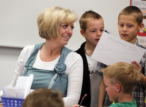 Al Hartmann  |  The Salt Lake Tribune
Teacher Pam Hansen at Viewmont Elementary in the Murray School District has won a Golden Apple Award.