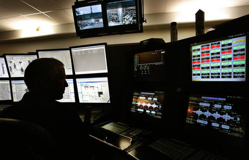 Scott Sommerdorf  |  The Salt Lake Tribune             
Brent Dall, lead operator in the hydrogen area, monitors screens in the plant's main control room at HollyFrontier in Woods Cross, Thursday, April 27, 2012. The refinery is one of three in Utah that are expanding in order to process more Utah black wax crude produced in the Uinta Basin in eastern Utah.