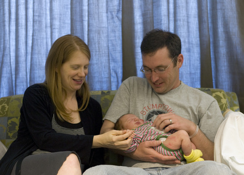 Kim Raff  |  The Salt Lake Tribune
Annette and Ken Clark with their newborn daughter, Riley Clark, at University Hospital in Salt Lake City. They plan for Riley to breast-feed for six months.