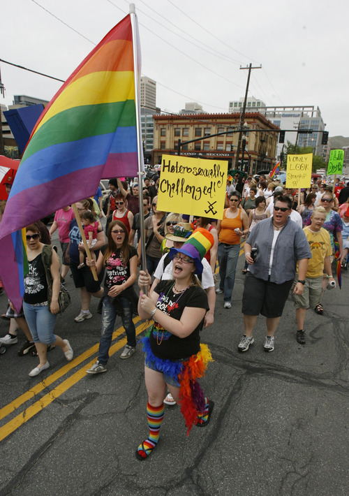 Francisco Kjolseth  |  Tribune file photo
In this archive photo from the 2011 Pride Festival, Carrie Bronsonmarches toward the City and County Building. This year's Utah Pride Festival is this weekend.