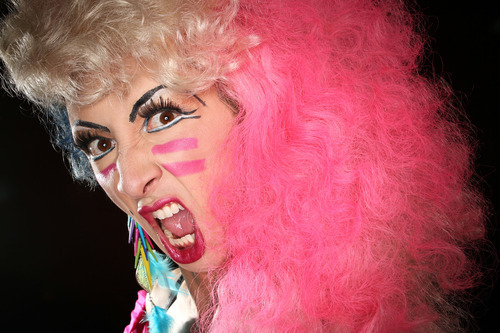 Francisco Kjolseth  |  The Salt Lake Tribune
Feather (boa) touch: Swenson all but disappears as Hedwig takes over.
