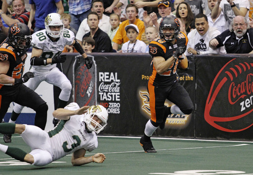 Lennie Mahler  |  The Salt Lake Tribune
Utah Blaze Chris Bocage breaks away from the defense against the San Jose SaberCats at EnergySolutions Arena on Saturday, March 24, 2012.