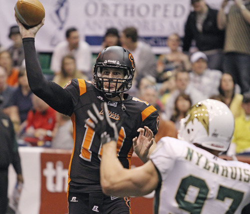 Lennie Mahler  |  The Salt Lake Tribune
Utah Blaze quarterback Tommy Grady fires a pass in the first half against the San Jose SaberCats at EnergySolutions Arena on Saturday, March 24, 2012.