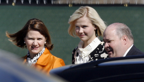 Steve Grifffin  |  The Salt Lake Tribune

Salt Lake City  Elizabeth Smart, center, leaves the Federal Courthouse with her mother, Lois Smart, in Salt Lake City  Thursday Oct 1, 2009.  Smart testified for the first time about her 2002 abduction and nine months of captivity at the hands of Brian David Mitchell, in a larger hearing on whether Mitchell is mentally competent to stand trial in her kidnapping.