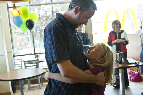 Chris Detrick  |  The Salt Lake Tribune
Elayna Saley, 8, hugs her dad, Chad, as she is announced the winner at McDonald's in Salt Lake City on Wednesday, June 6, 2012. As one of only two winners nationwide, Saley will get to travel to London this summer to attend the 2012 Summer Olympics.