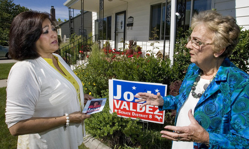 Paul Fraughton / Salt Lake Tribune
Josie Valdez, a Democratic  candidate for the Utah Senate, while canvasing in a Midvale neighborhood  talks with the mayor of Midvale JoAnn Seghini.

 Friday, June 1, 2012