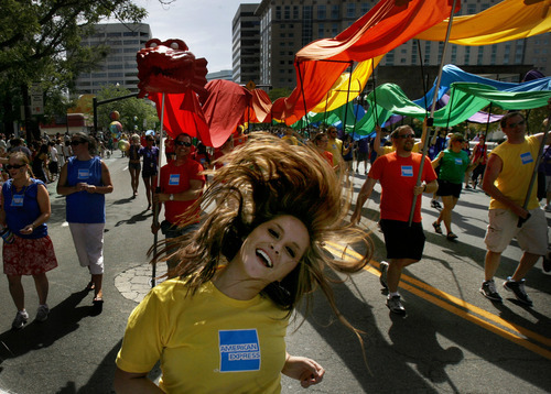 Scott Sommerdorf  |  The Salt Lake Tribune             
The American Express entry at the annual Gay Pride Parade through downtown Salt Lake City, Sunday, June 3, 2012.