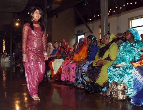 Rick Egan  | The Salt Lake Tribune 

Sital, models fashions from Nepal, in the second annual Women of the World's Refugee Fashion Show, Friday, June 8, 2012. The fashion show featured women from around the world displaying their handmade cultural fashions.
