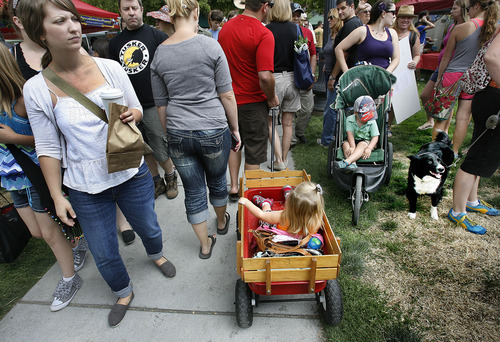 Scott Sommerdorf  |  The Salt Lake Tribune             
As usual, dogs and infants were plentiful at the opening Saturday of the Salt Lake Farmers Market, Saturday, June 9, 2012.