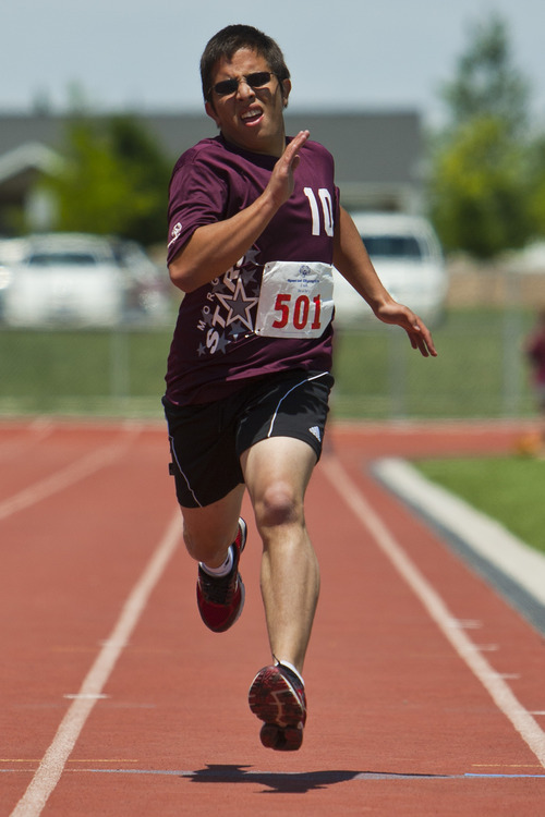 Chris Detrick  |  The Salt Lake Tribune
Brandon Little, of the Morgan Stars team, competes in the 800 meter run during the 43rd Special Olympics summer games at Herriman High School Saturday June 9, 2012.