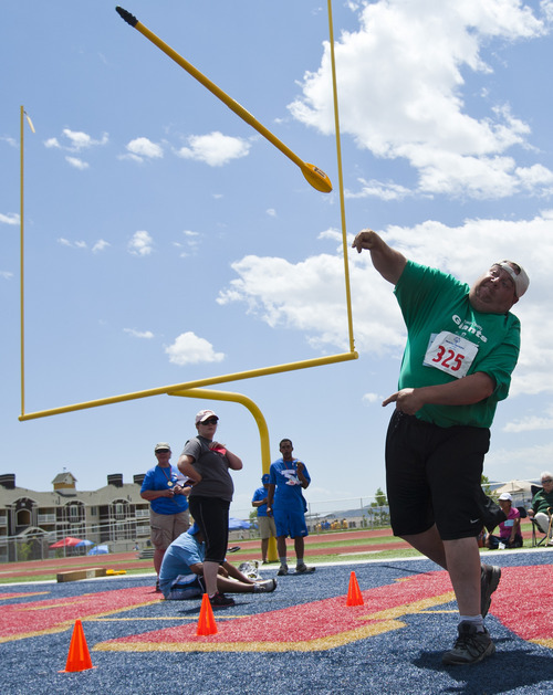 Chris Detrick  |  The Salt Lake Tribune
Tom Fisher, of team Tooele County Giants, competes in the turbojav event during the 43rd Special Olympics summer games at Herriman High School Saturday June 9, 2012.