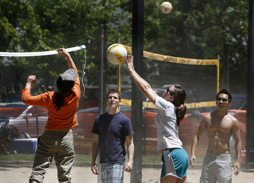 Scott Sommerdorf  |  The Salt Lake Tribune             
Multiple teams played volleyball on the new beach volleyball courts in Liberty Park in Salt Lake City, Sunday, June 10, 2012.