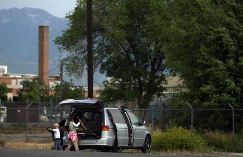 Kim Raff | The Salt Lake Tribune
People park on 300 South between 500 and 600 West, an area that had one of the highest rates of car break-ins in the city last year, across the street from the Intermodal Hub in Salt Lake City on May 26, 2012.