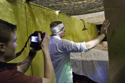 Chris Detrick  |  The Salt Lake Tribune
Director and cinematographer Denver Harward shoots a scene with actor Nathan Day 