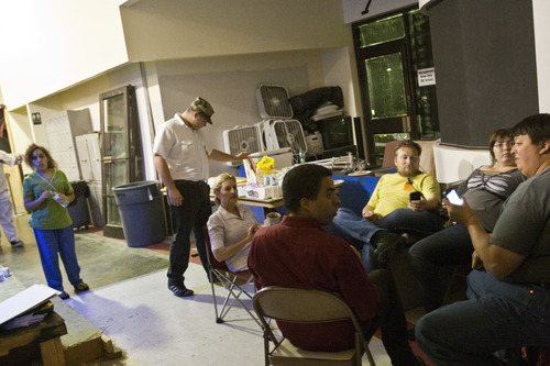 Chris Detrick  |  The Salt Lake Tribune
Actors and crew members wait to shoot a scene while making a movie at Castle of Chaos Haunted House during the 48 Hour Film Project Saturday June 9, 2012. Teams of filmmakers get 48 hours to create a movie that is submitted as an entry in the 48 Hour Film Festival.