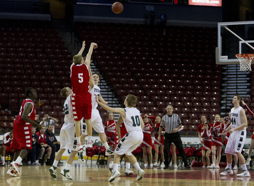 Trent Nelson  |  The Salt Lake Tribune
East's Parker Van Dyke takes a desperation three-pointer in the final seconds. East vs. Olympus, 4A High School Basketball Championships Wednesday, February 29, 2012 at the Maverik Center in West Valley City, Utah.