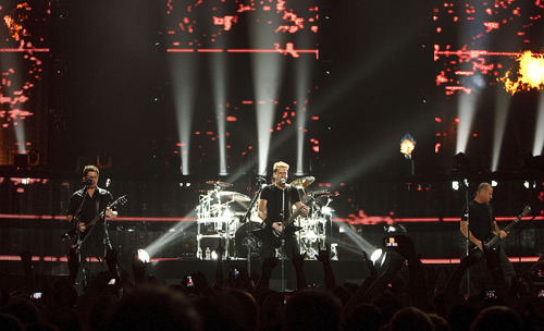 Leah Hogsten  |  The Salt Lake Tribune
Nickelback performs at EnergySolutions Arena on Tuesday, June 12, 2012, in Salt Lake City, featuring Chad Kroeger on vocals and guitar, Ryan Peake on guitar and backing vocals, Mike Kroeger on bass and Daniel Adair on drums and backing vocals.