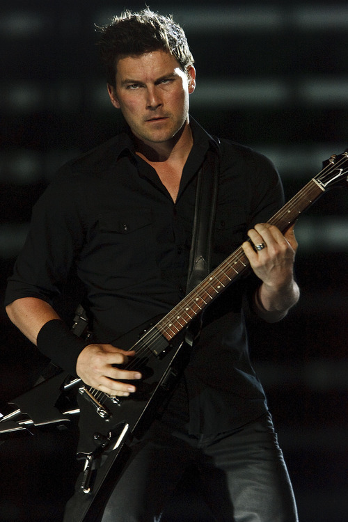 Leah Hogsten  |  The Salt Lake Tribune
Nickelback performs at EnergySolutions Arena on Tuesday, June 12, 2012, in Salt Lake City, featuring Chad Kroeger on vocals and guitar, Ryan Peake  on guitar and backing vocals, Mike Kroeger on bass and Daniel Adair on drums and backing vocals.
