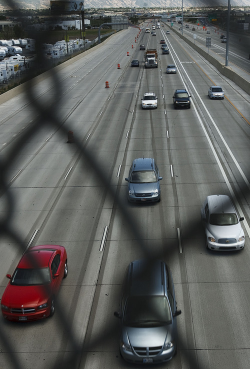Leah Hogsten  |  The Salt Lake Tribune
A view of Interstate 15 northbound from the Sam White Bridge in American Fork on Wednesday, June 13, 2012. All northbound and southbound lanes will be open for travel, without construction barrels, for the Thursday morning commute June 14 in Utah County from Lehi to Pleasant Grove.