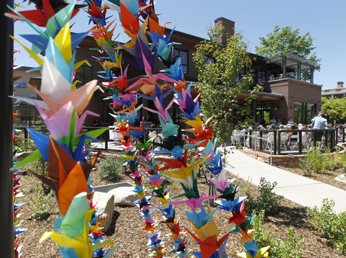 Al Hartmann  |  The Salt Lake Tribune 
One thousand origami cranes decorated the grounds as the YWCA dedicated its new Center for Families, which will house an expanded Salt Lake Area Family Justice Center and the YWCA's Community Education Program. The building is located at 310 E. 300 South, Salt Lake City.