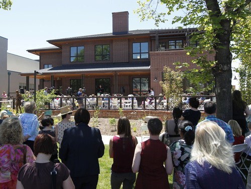 Al Hartmann  |  The Salt Lake Tribune 
People gather in the shade as the YWCA dedicates its new Center for Families, which will house an expanded Salt Lake Area Family Justice Center and the YWCA's Community Education Program at 310 E. 300 South in Salt Lake City.