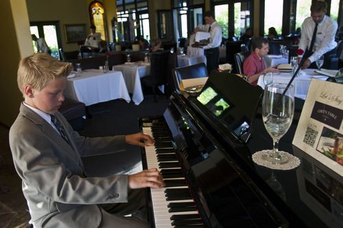 Chris Detrick  |  The Salt Lake Tribune
Joey Buck, 13, performs on the piano at Orem's Chef's Table.