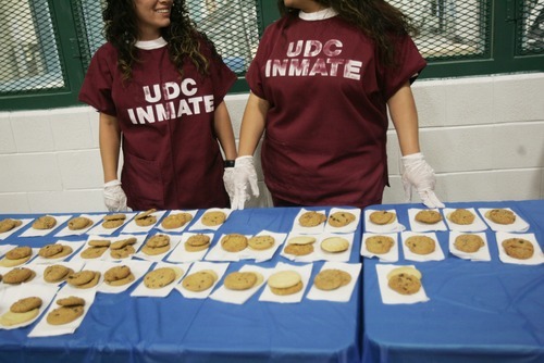 Kim Raff | The Salt Lake Tribune
Inmates serve cookies in the gym at the Timpanogos Women's Facility at the Utah State Prison after a commencement ceremony for fellow inmates who received high school and G.E.D. diplomas June 13, 2012. The Utah State Prison and Canyons School District presented diplomas to about 340 men and women.