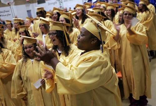 Kim Raff | The Salt Lake Tribune
Women from the Timpanogos Women's Facility celebrate receiving their high school diplomas during commencement exercises in Draper, Utah, on June 13, 2012. The Utah State Prison and Canyons School District presented diplomas to about 340 men and women who have graduated from the prison's high school or G.E.D. programs.