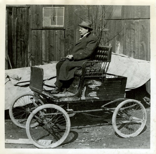 Tribune file photo

Hyrum A. Silver rides on the first car ever bought in Utah. He bought the car in 1896.