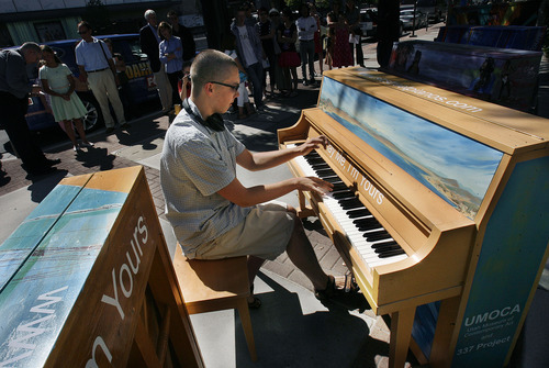 Scott Sommerdorf  |  The Salt Lake Tribune             
Pianist David Horton plays outside the Utah Museum of Contemporary Art on Thursday, June 14 as the museum unveiled its public-art exhibit, 