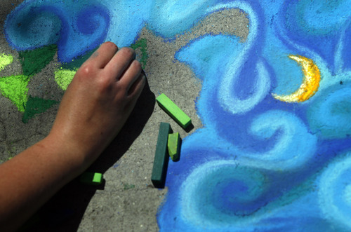 Rick Egan  | The Salt Lake Tribune 

Dawn Taylor works on her chalk art, at the Utah Foster Care Foundation's Annual Chalk Art Festival, at the Gateway in Salt Lake City, Friday, June 15, 2012.  The festival continues through Saturday.