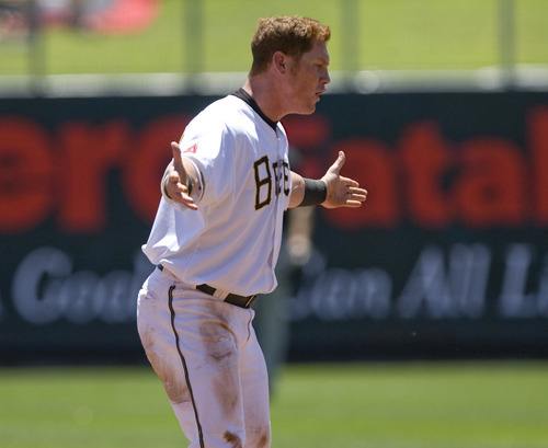 Kim Raff | The Salt Lake Tribune
Salt Lake Bees player Kole Calhoun reacts to being called out at second after attempting to steal the base during a game against the Fresno Grizzlies at Spring Mobile Ballpark inSalt Lake City on June 17, 2012.