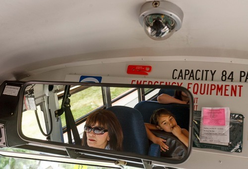 Trent Nelson  |  The Salt Lake Tribune
School bus driver Sylvia Wouters drives students from Pleasant Green Elementary School Friday, June 15, 2012 in Magna, Utah. Granite School District has installed video cameras on school buses.