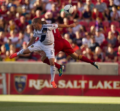 Trent Nelson  |  The Salt Lake Tribune
L.A.'s Bryan Jordan and RSL's Chris Wingert leap for the ball as Real Salt Lake hosts the L.A. Galaxy at Rio Tinto Stadium on Wednesday, June 20, 2012, in Sandy.