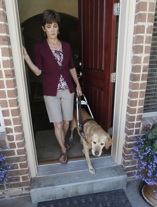 Al Hartmann  |  The Salt Lake Tribune 
Becky Andrews and her  service dog Cricket weren't allowed in the Ann Taylor store at City Creek.   She has retinitis pigmantosa, a degenerative eye disease and she relies on Cricket as her set of eyes and goes with her everywhere.