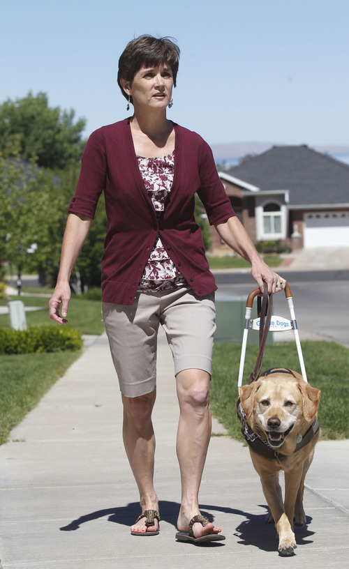 AAl Hartmann  |  The Salt Lake Tribune 
Becky Andrews and her  service dog Cricket weren't allowed in the Ann Taylor store at City Creek.   She has retinitis pigmantosa, a degenerative eye disease and she relies on Cricket as her set of eyes and goes with her everywhere.