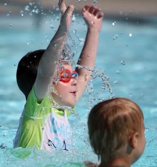 Francisco Kjolseth  |  The Salt Lake Tribune
 Joshua Kubinak, 5, bobs up and down during a morning swim lesson at Steiner Aquatic Center in Salt Lake on Thursday, June 14, 2012. This is the third year Joshua has been enrolled in swimming classes.