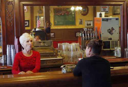 Al Hartmann  |  The Salt Lake Tribune 
Red Banjo Banjo Pizza Parlour's Mary Lou Toly talks with a local Park Citian at the 100 year-old bar from the cityy's early miner's era.  Toly started the restaurant in 1962 and is the oldest family-owned business in Park City.  The restaurant's 50th birthday celebration will take place Sunday.