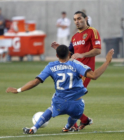 San Jose Earthquakes defender Jason Hernandez blocks a shot from Real Salt Lake forward Fabian Espindola in RSL's 1-2 home loss in Rio Tinto Stadium in Sandy, Utah.
Stephen Holt / Special to the tribune