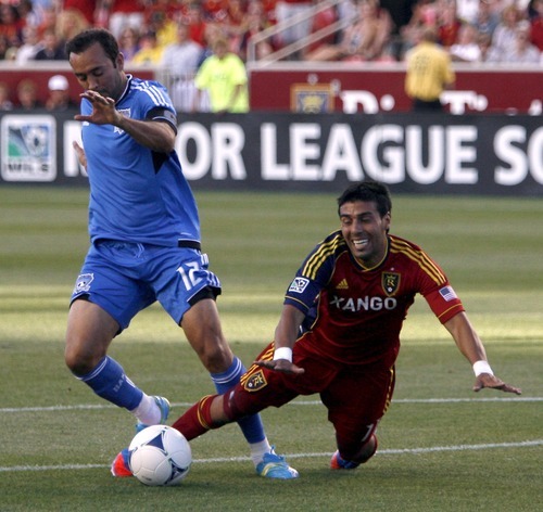 Real Salt Lake midfielder Javier Morales is put down at the top of the box with no call by San Jose Earthquakes defender Ramiro Corrales in the first half at Rio Tinto Stadium in Sandy, Utah.
Stephen Holt / Special to the tribune