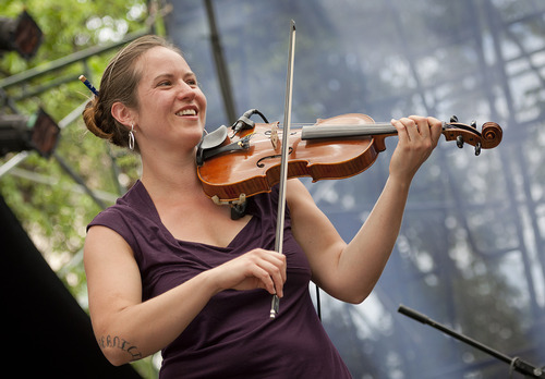 Michael Mangum  |  Special to the Tribune

Bronwen Beecher plays the violin in a group performance of the Salt Lake City-based celtic fusion band named Stonecircle at the Utah Arts Festival in downtown Salt Lake City on Sunday, June 24, 2012.